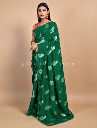 Amazing bandhej dark green saree