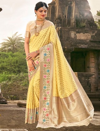 Amazing yellow banarasi silk saree for wedding occasions