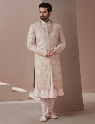 Baby pink lavish groom wear sherwani in raw silk