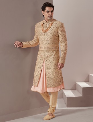 Beige and peach groom wear sherwani in raw silk