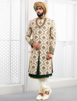 Cream colored designer groom wear sherwani
