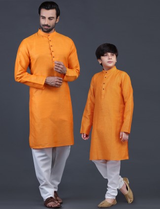 Father and son festive wear cotton kurta suit in orange