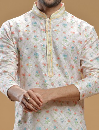 Festive wear off white silk kurta suit in printed