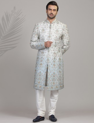 Fresh and stylish grey and blue shade silk sherwani for groom