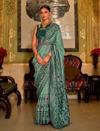Green shaded silk patola printed saree