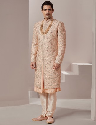 Lavish groom wear raw silk sherwani in peach