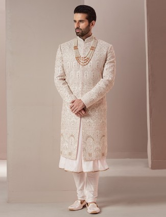 Light pink raw silk groom wear stunning sherwani