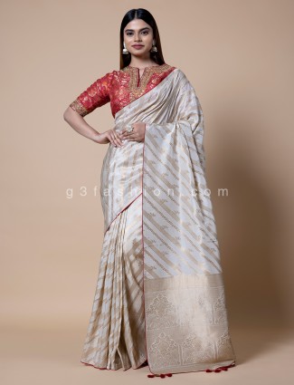 Off white silk saree with zari weaving