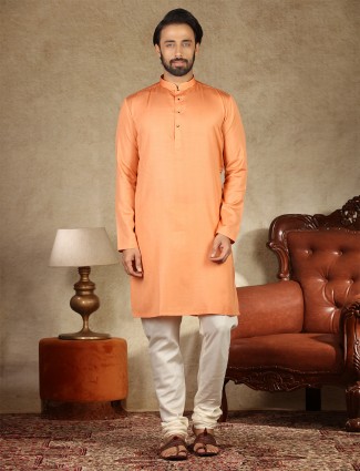Peach hue solid cotton fabric kurta suit
