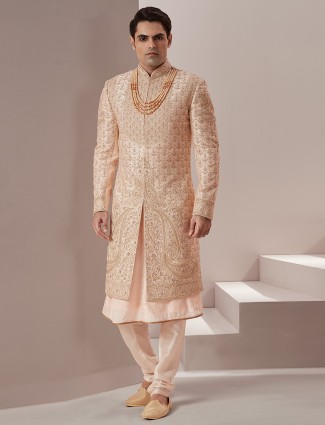Powder pink rich raw silk groom wear sherwani