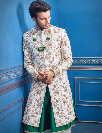 White silk groom wear sherwani