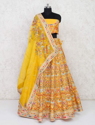 Yellow semi stitched lehenga choli in silk wedding
