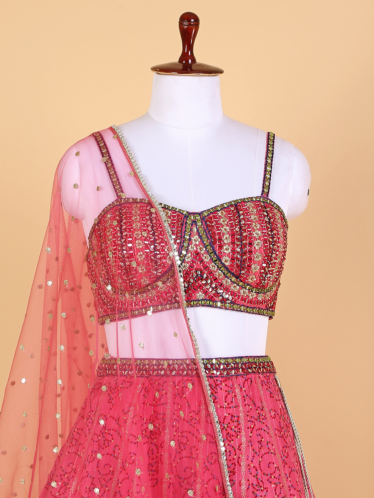 Coral pink bridal lehenga discount