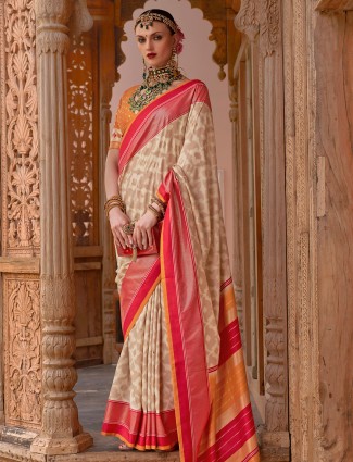 Beige silk foil print saree with contrast border