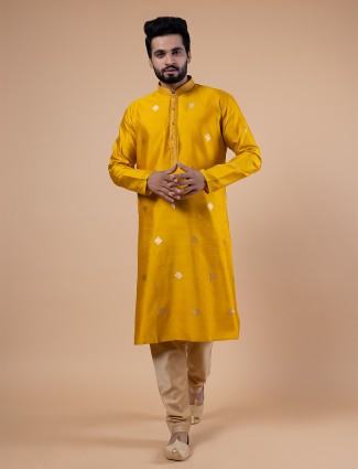 Bright yellow raw silk zari work kurta suit