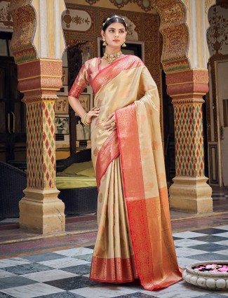 Cream banarasi silk saree with contrast border
