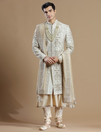 Designer cream color raw silk fabric sherwani