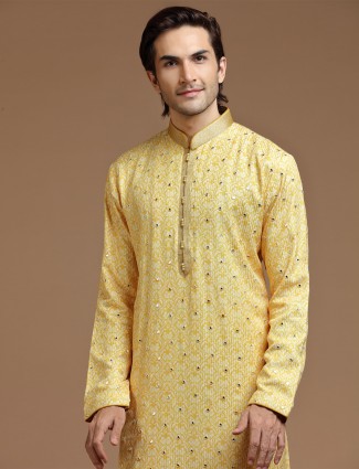 Festive look silk yellow kurta suit in printed