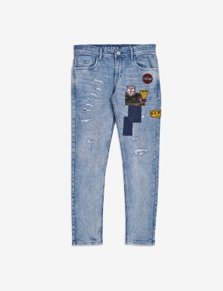 Kozzak light blue washed and ripped jeans
