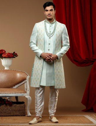 Latest pista green hued cotton silk wedding wear indowestern