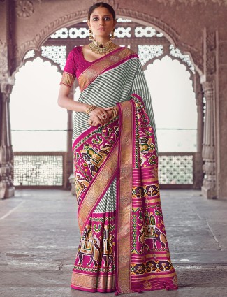 Magenta charming patola silk wedding saree for women