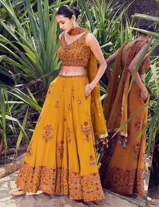 Mustard yellow georgette crop top style palazzo suit