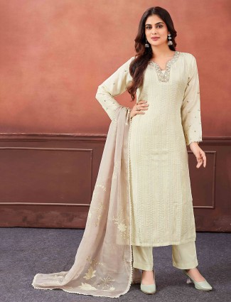Off-white salwar suit with floral dupatta