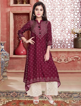 Palazzo style maroon hued party wear salwar suit
