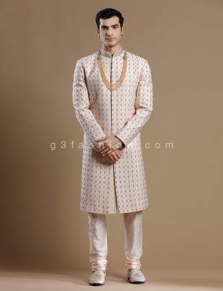 Peach lavish groom wear sherwani in raw silk