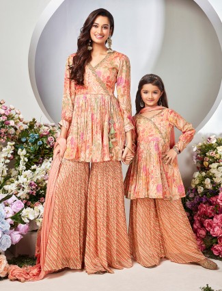 Peach printed sharara suit for mother daughter