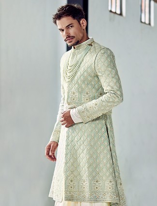 Pista green silk anarkali sherwani for groom