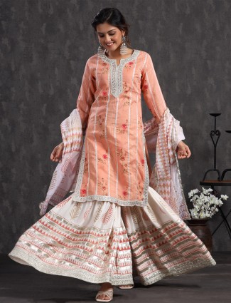 Punjabi style festive wear peach cotton kurti set