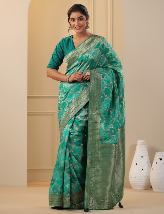 Rama green printed saree in dola silk