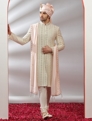 Raw silk fabric cream hue sherwani for groom