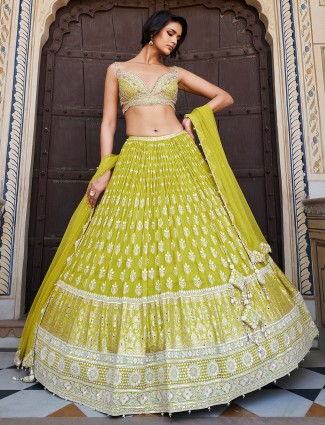 Buy Twisted threads net light peach lehenga with stylish heavy dupatta at  fealdeal.com