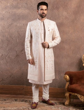 Trendy silk cream groom sherwani