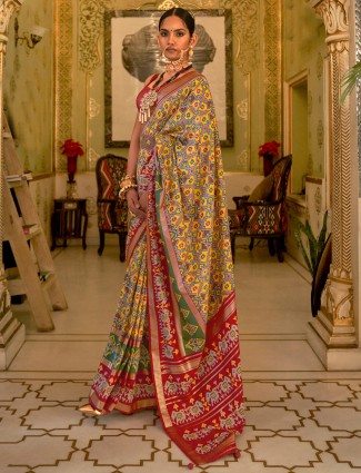 Trendy yellow printed silk wedding wear saree