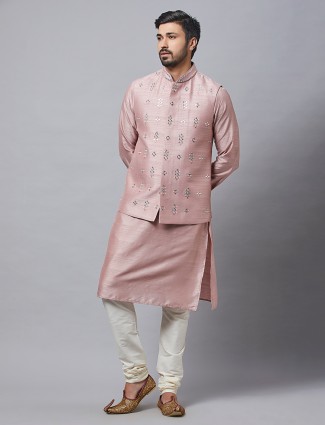 Waistcoat paired with onion pink raw silk kurta suit