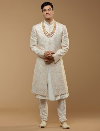 Wedding wear peach hued silk sherwani