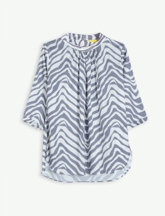White and grey polyester printed top