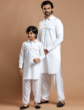 White festive wear cotton silk pathani suit for father and son