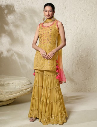 Yellow embroidery sharara suit in georgette