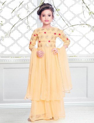 Yellow shade wedding wear palazzo suit for girls
