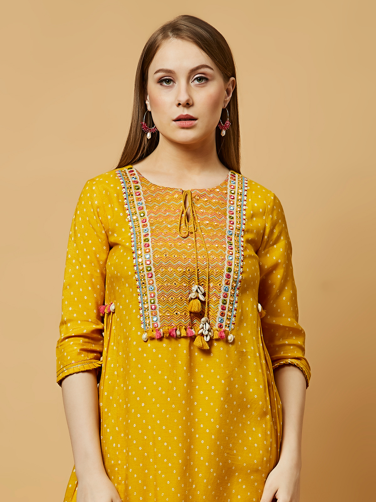 Tvis and Bliss. Hand Embroidered Yellow Georgette Lucknow Chikankari Short  kurti